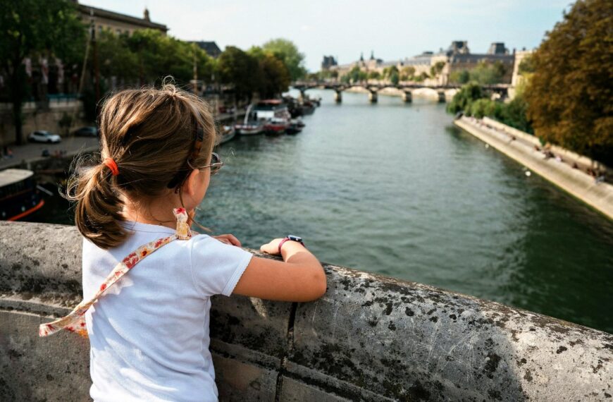 girl on the Seine River bridge
